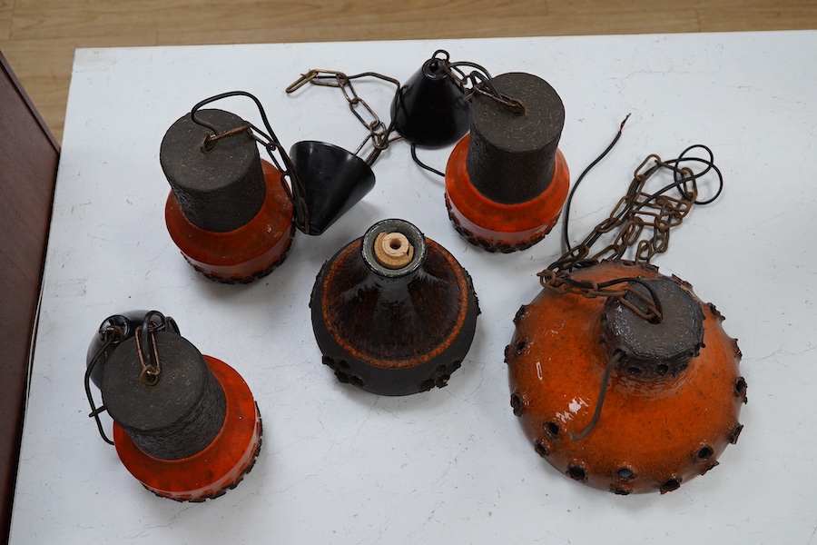 A set of three 1970s Danish pottery brown and orange glazed pendant lights and two other larger similar pottery lights, 19cm high (5). Condition - good